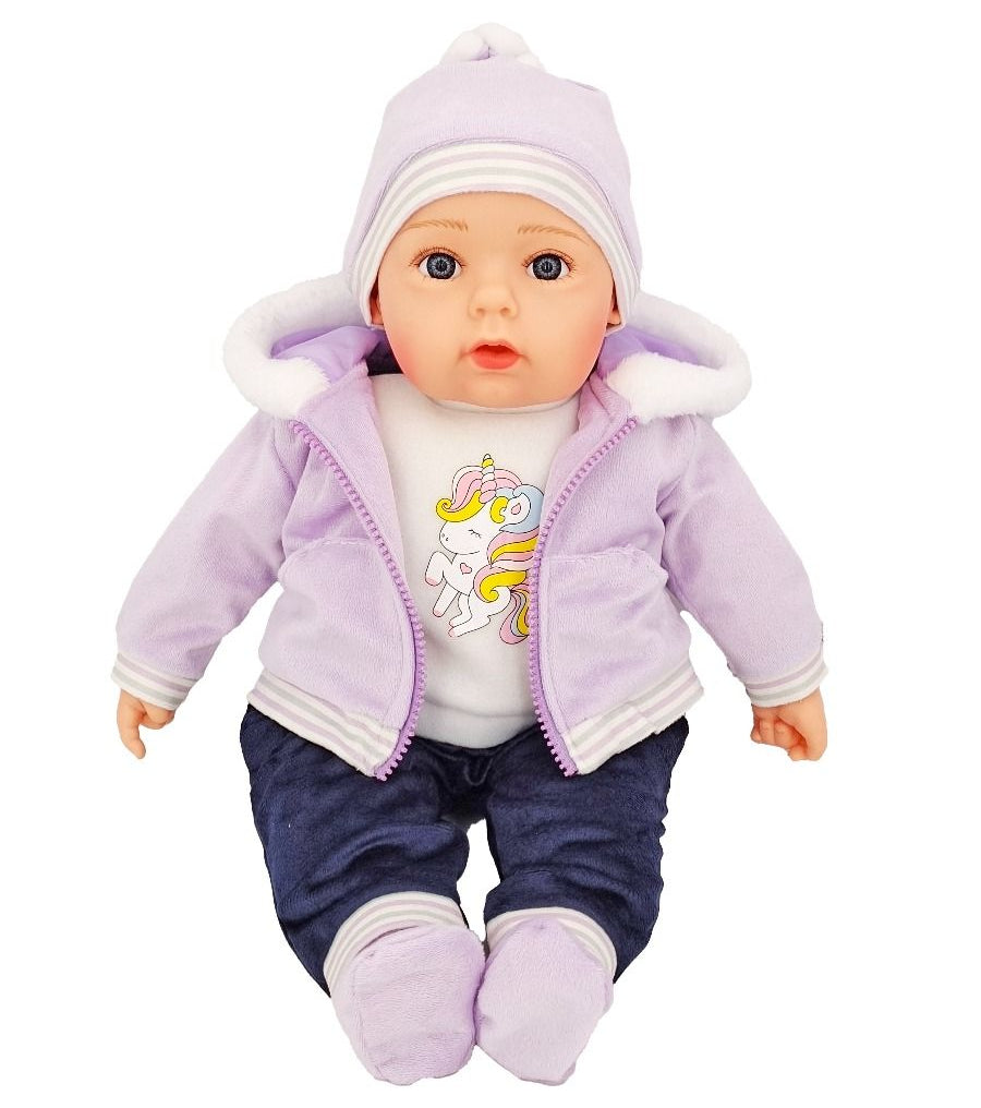 Baby doll wearing a purple jacket and outfit on a white background