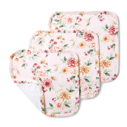 Set of floral-patterned pads on a white background