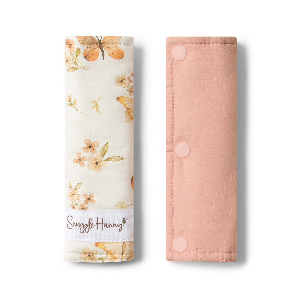 Floral-patterned product packaging with 'Snuggle Hunny' branding on a white background