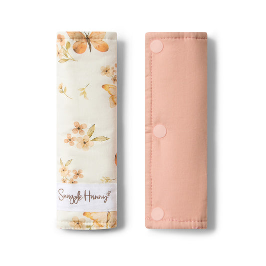 Floral-patterned product packaging with 'Snuggle Hunny' branding on a white background