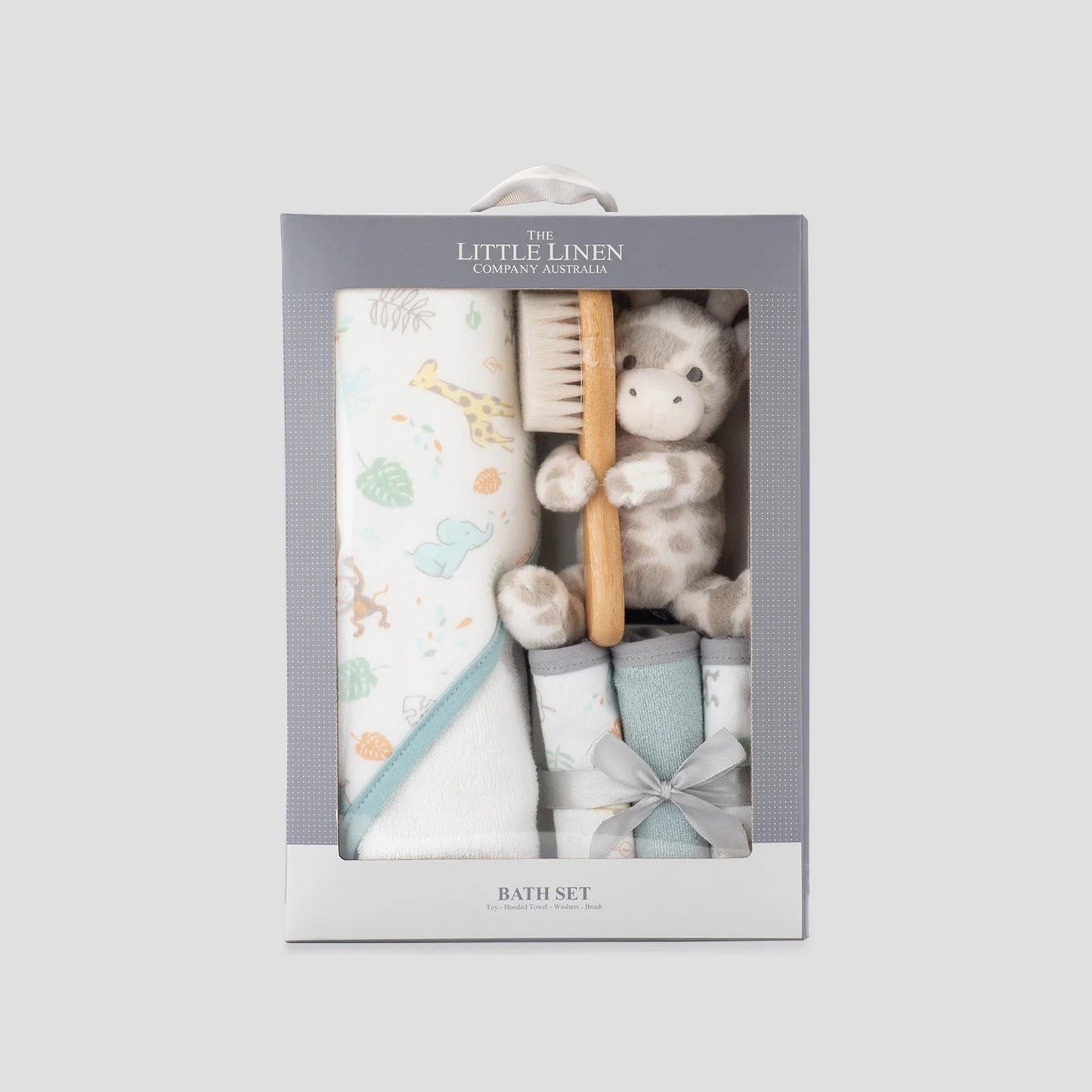 Baby bath set with towel, brush, and toy in a box labeled 'The Little Linen Company'.