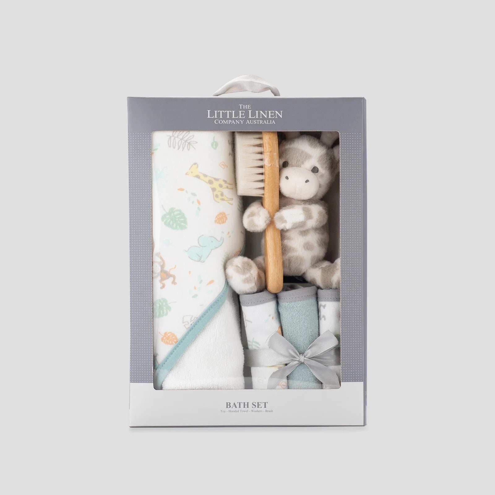 Baby bath set with towel, brush, and toy in a box labeled 'The Little Linen Company'.
