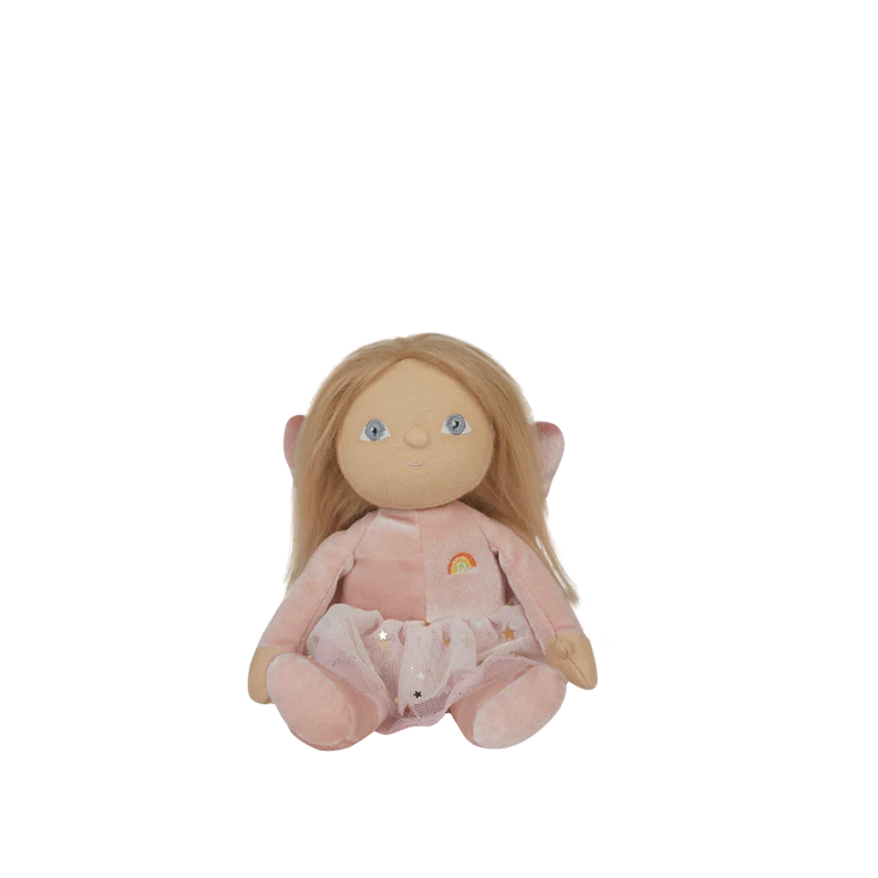Plush toy fairy with blonde hair and blue eyes wearing a pink outfit on a white background