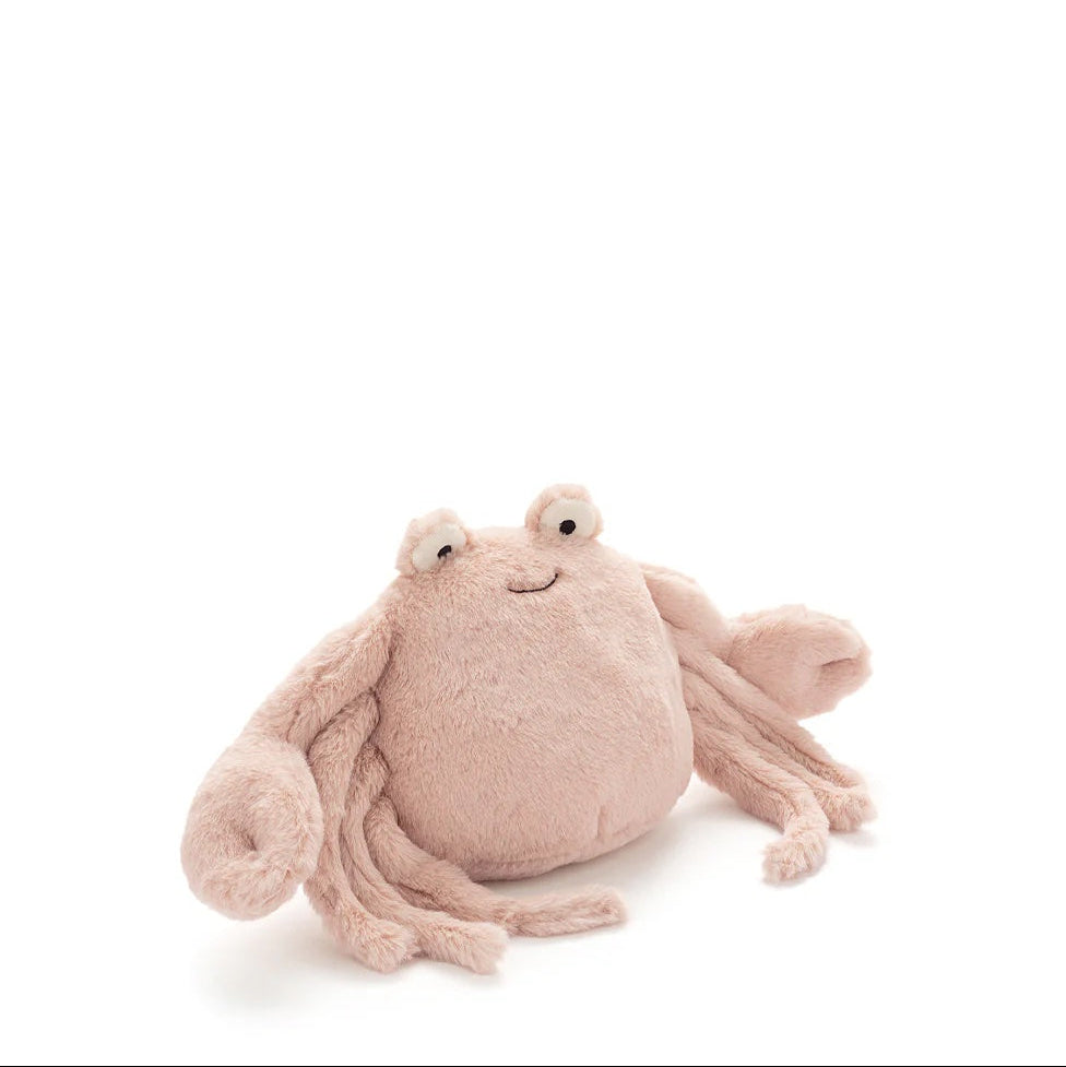 Plush crab toy on a white background