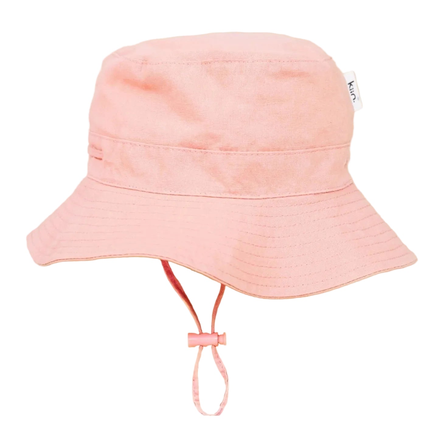 Pink bucket hat with a strap on a beige background