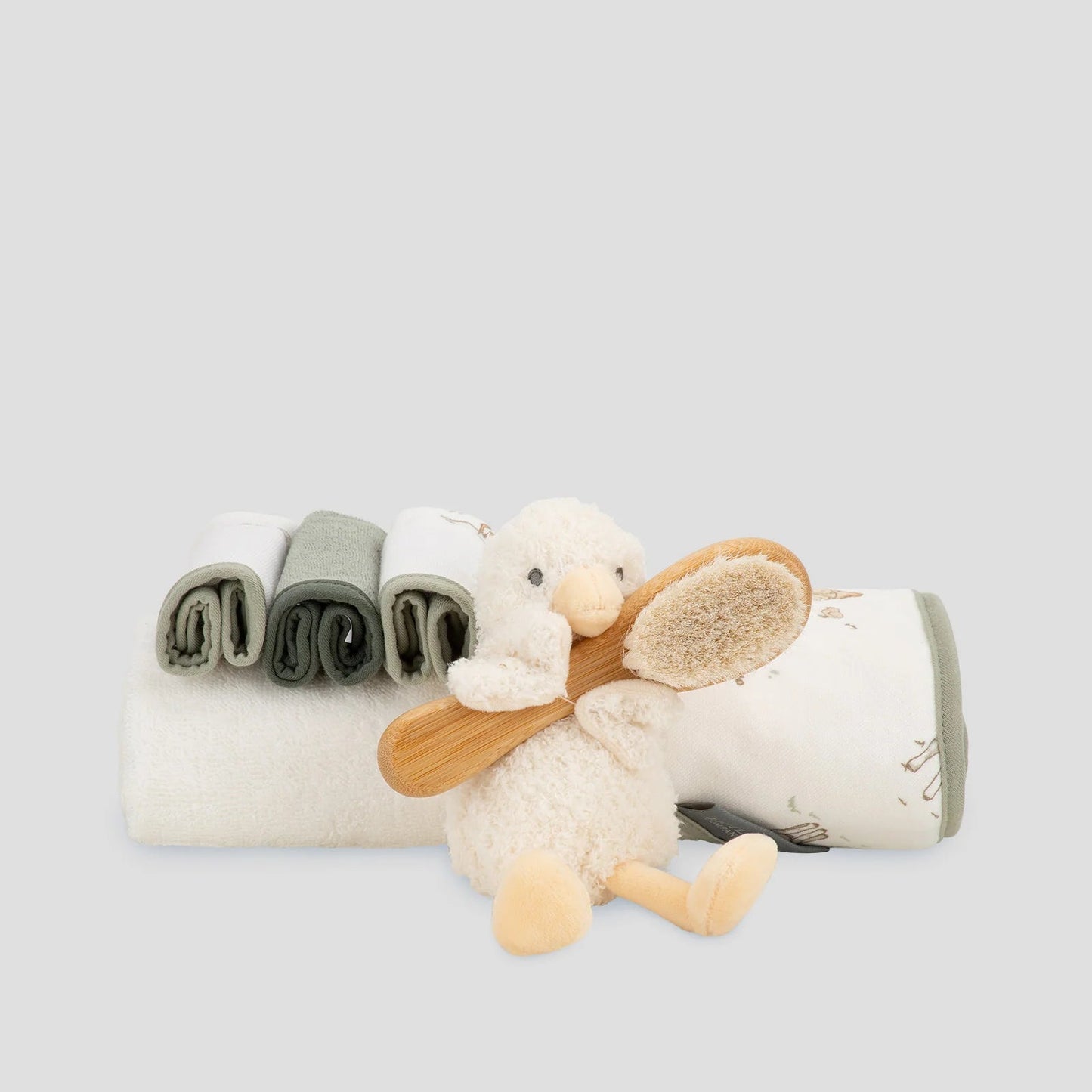Plush toy with a wooden airplane propeller on a white background