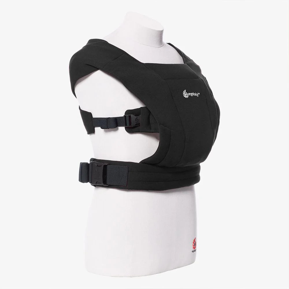 Black baby carrier on a mannequin with a white background