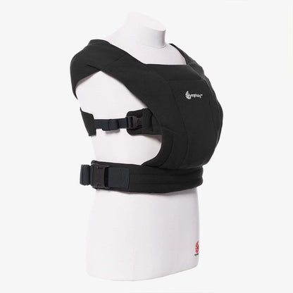 Black baby carrier on a mannequin with a white background