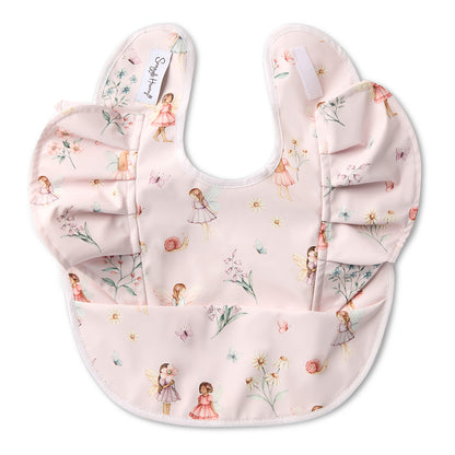 Floral-patterned baby bib with ruffles on a white background