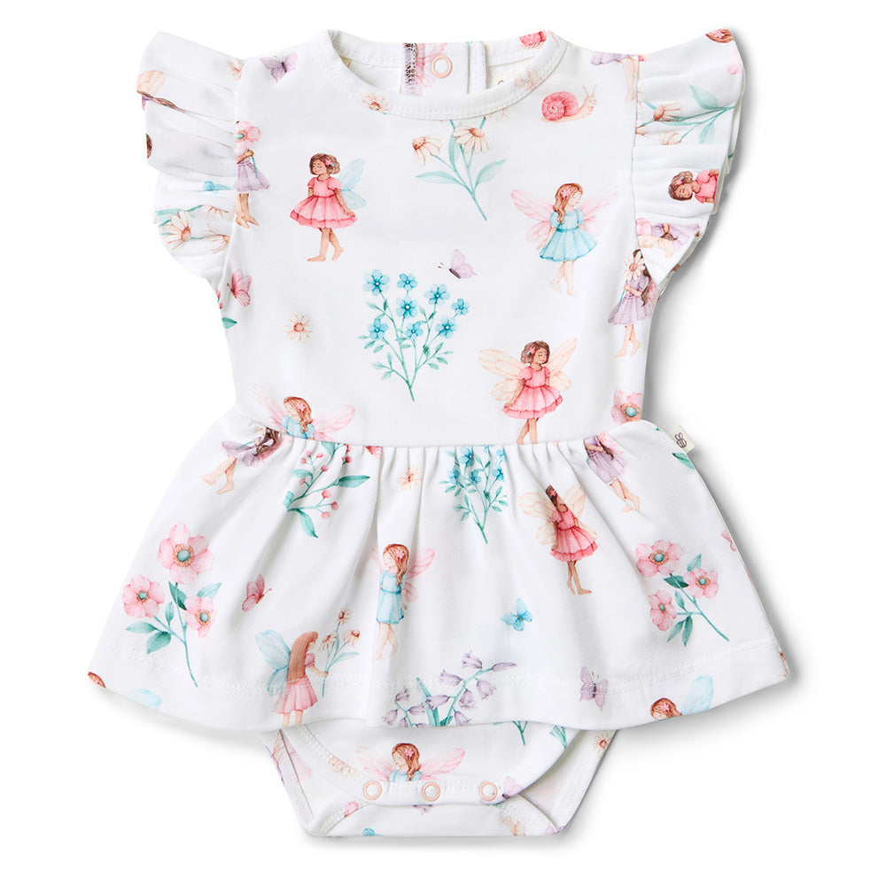 Children's outfit with floral and fairy print on a white background