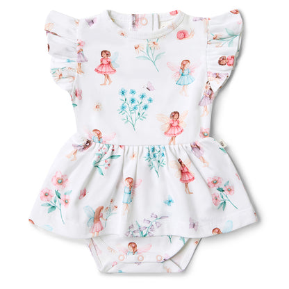 Children's outfit with floral and fairy print on a white background