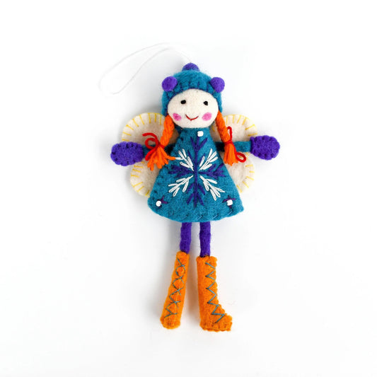 Felt fairy doll with blue dress and orange boots on a white background