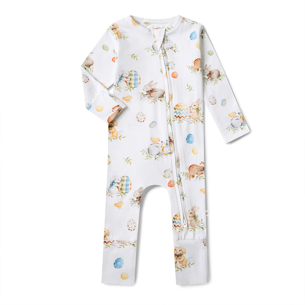 Baby onesie with animal pattern on a white background