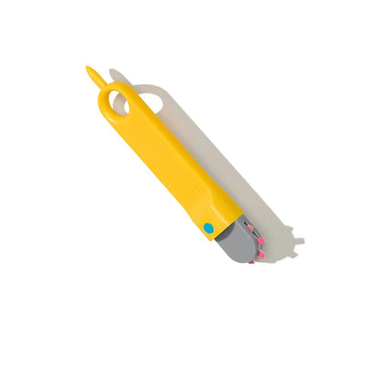 Yellow and gray utility knife on a white background
