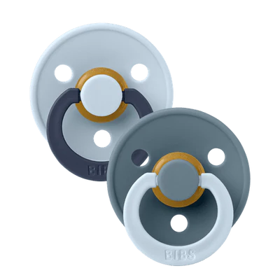 Two baby pacifiers with a white and gray design on a white background