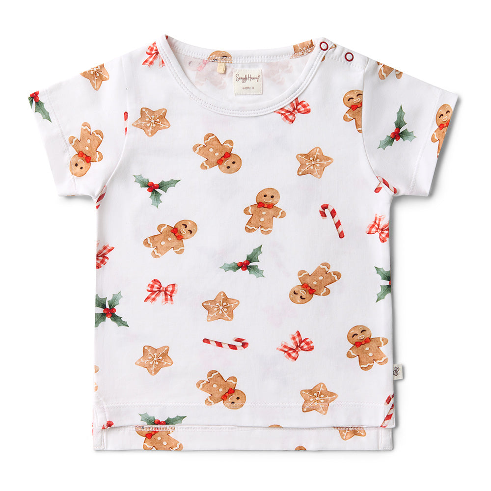 Children's t-shirt with gingerbread man and candy cane pattern on a white background