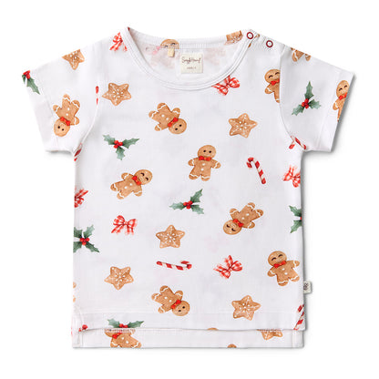 Children's t-shirt with gingerbread man and candy cane pattern on a white background