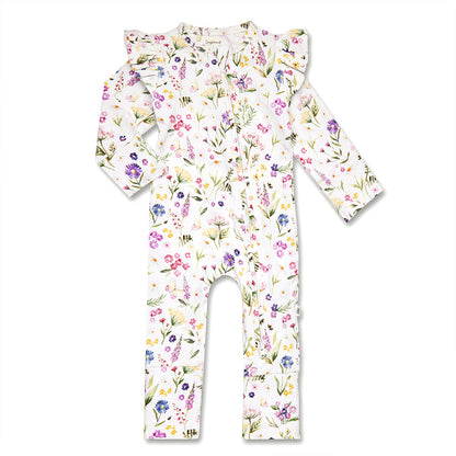 A baby long-sleeve footless one-piece jumpsuit with ruffled shoulder details, featuring a delicate watercolor floral print in pink, purple, green, and yellow on a white background.