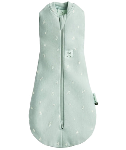 Light green baby sleeping bag with floral pattern on a white background
