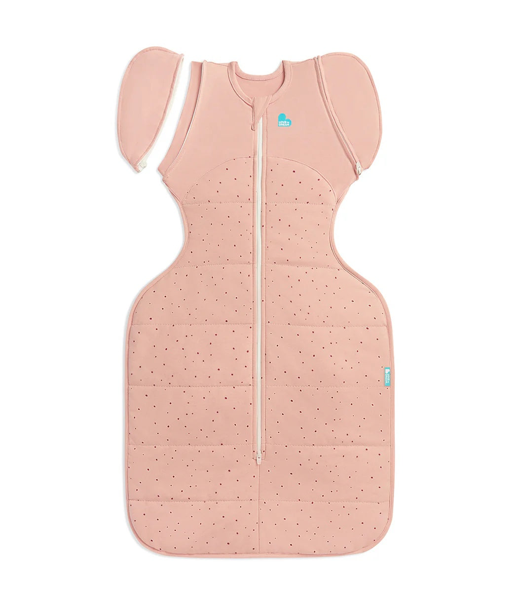 Pink baby sleeping bag with a zipper on a white background