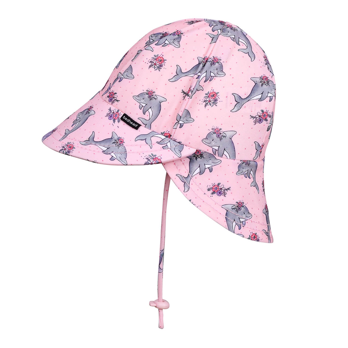 Pink sun hat with shark pattern on a white background