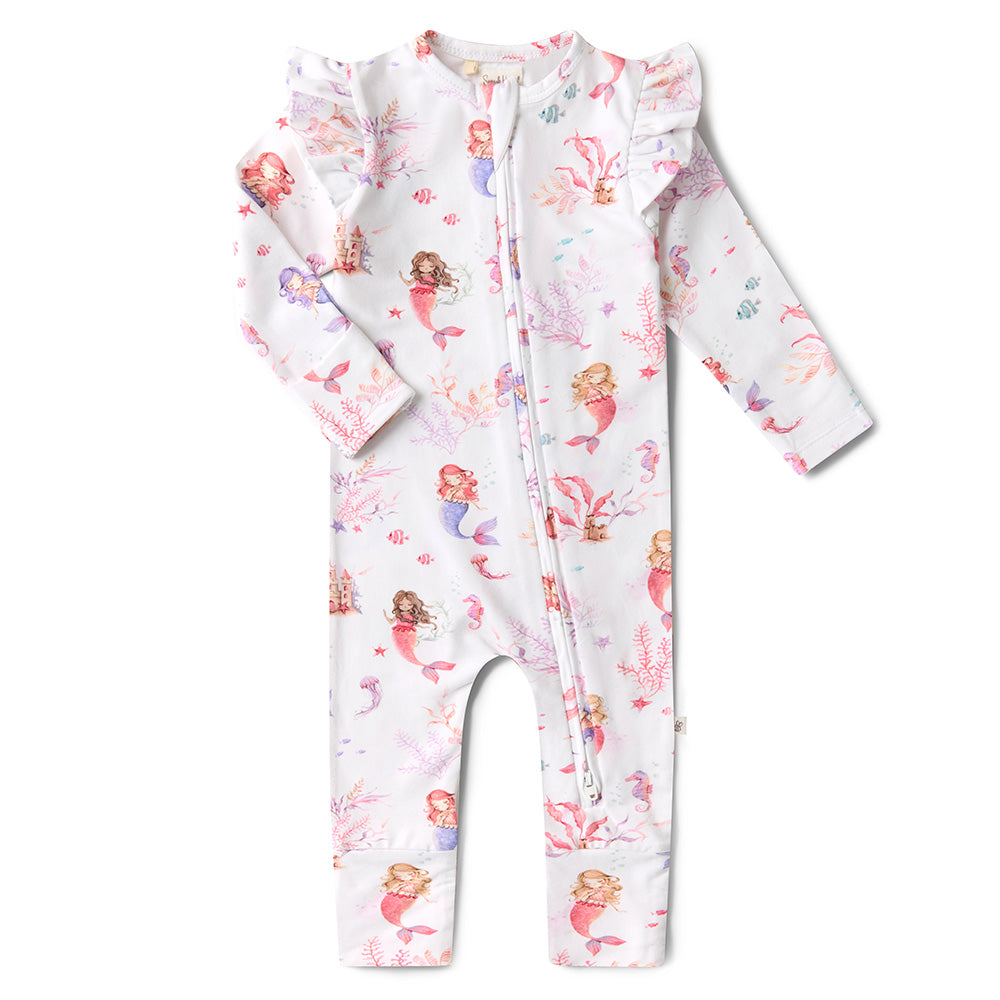 Baby onesie with mermaid pattern on a white background