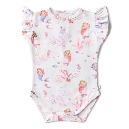 Baby onesie with mermaid pattern on a white background
