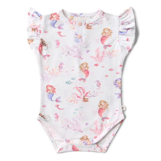 Baby onesie with mermaid pattern on a white background