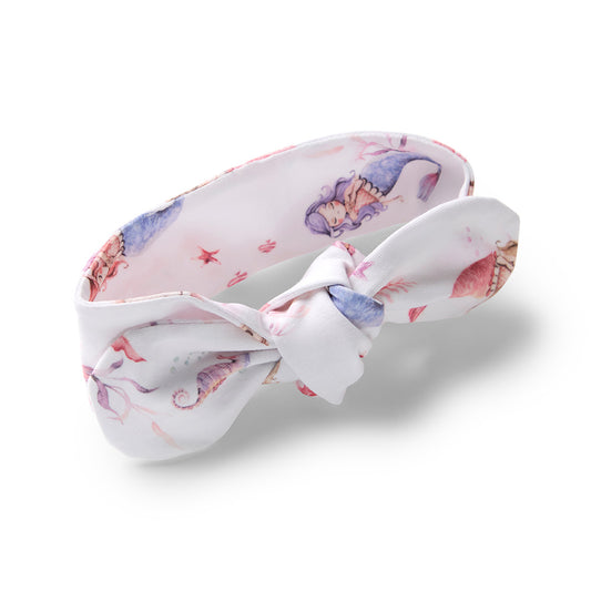 Headband with mermaid design on a white background