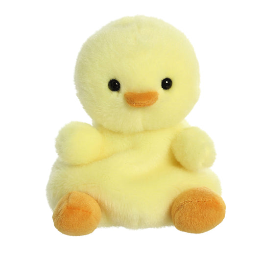 Yellow plush duck toy on a white background