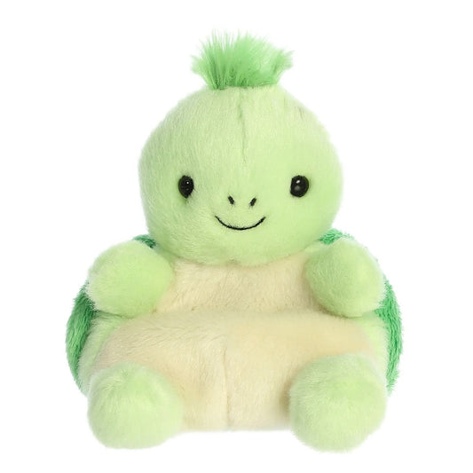 Green plush turtle toy with a white belly on a white background