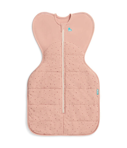 Pink baby wrap with a subtle pattern on a light gray background