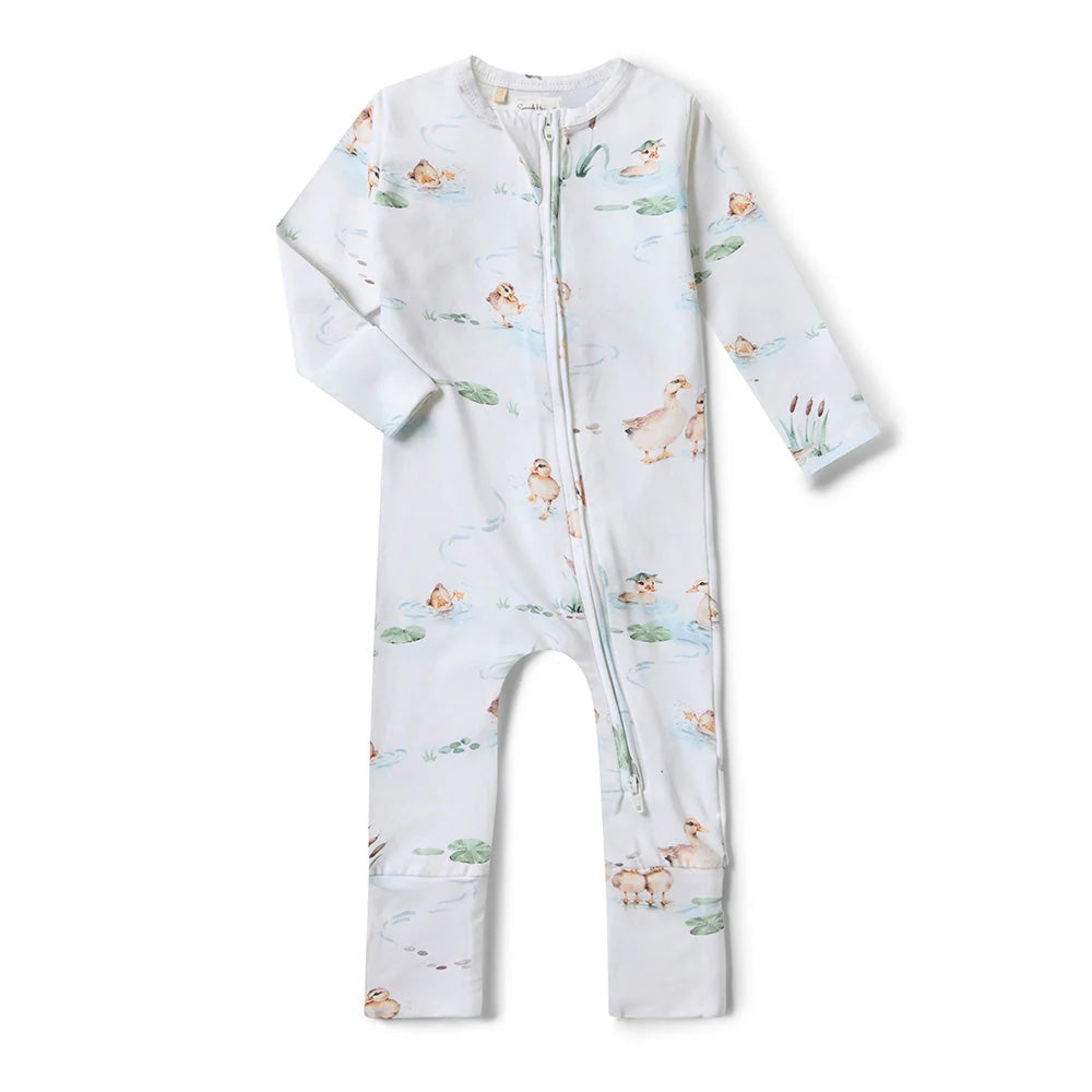 Baby onesie with animal pattern on a white background