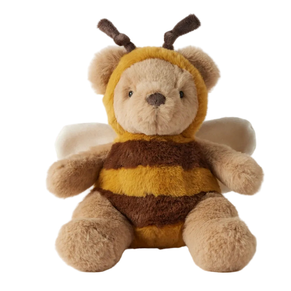 Stuffed toy bear wearing a bee costume on a white background