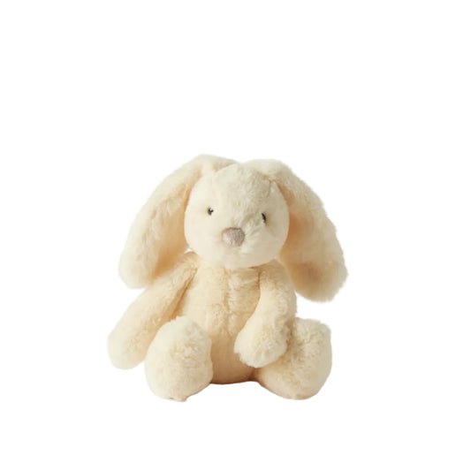 Cream-colored plush bunny toy on a light gray background