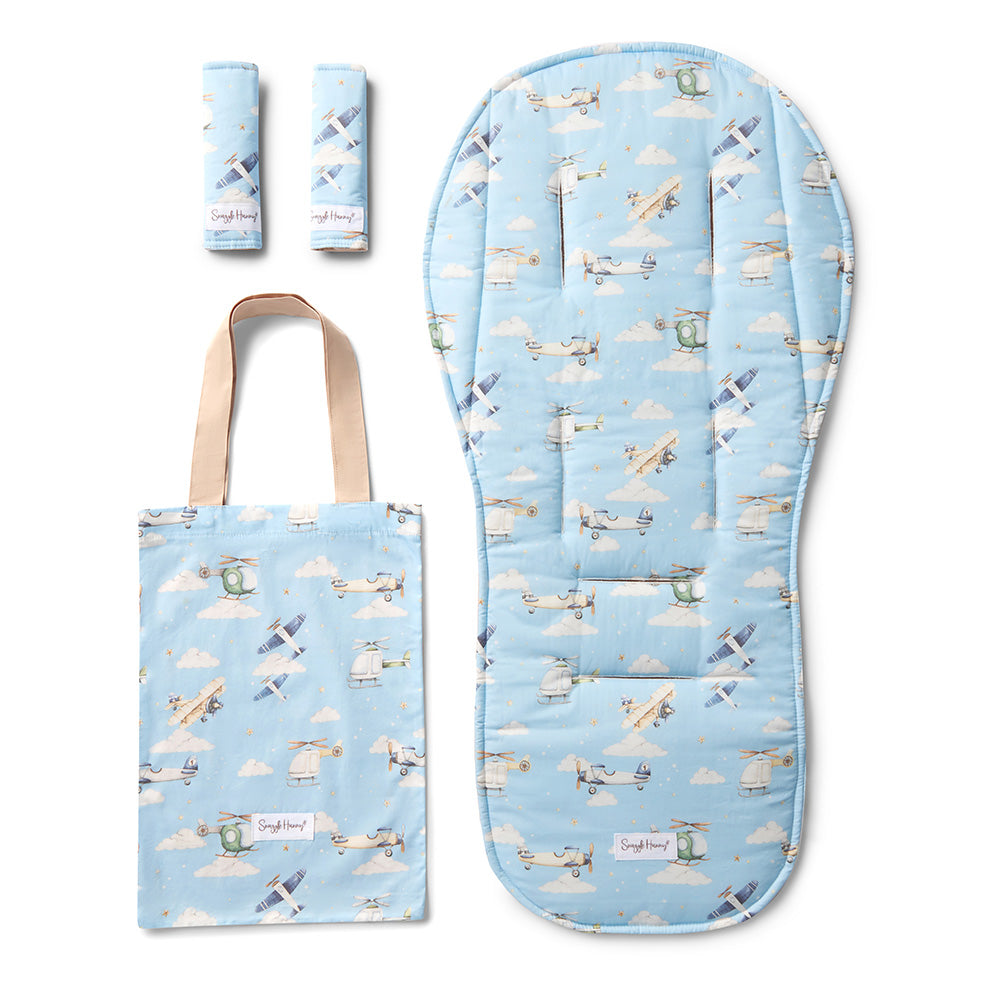 Baby product set with blue bag, mat, and wipes featuring airplane design on a white background