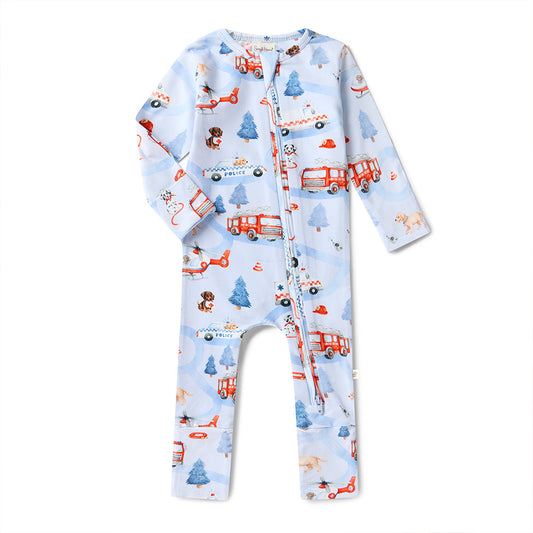 Children's onesie with fire truck and airplane pattern on a light blue background