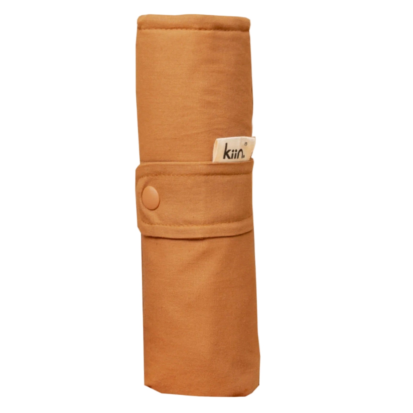 Brown fabric roll with a brand label on a beige background