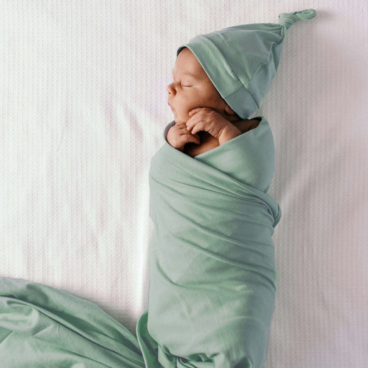 snuggle hunny kids baby pink top knot hat/baby beanie